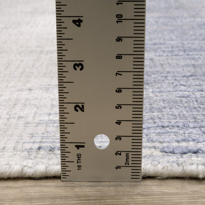 Oriental Weavers Clarke CLA06 soft modern rug featuring abstract pattern in blue/ ivory tones