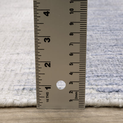 Oriental Weavers Clarke CLA06 soft modern rug featuring abstract pattern in blue/ ivory tones