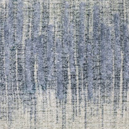 Oriental Weavers Clarke CLA06 soft modern rug featuring abstract pattern in blue/ ivory tones
