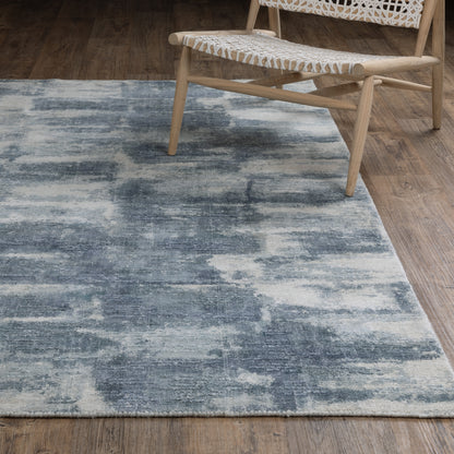Oriental Weavers Clarke CLA07 soft modern rug featuring abstract pattern in blue/ ivory tones