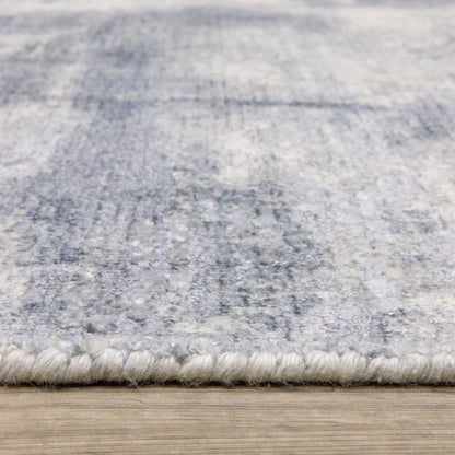 Oriental Weavers Clarke CLA07 soft modern rug featuring abstract pattern in blue/ ivory tones