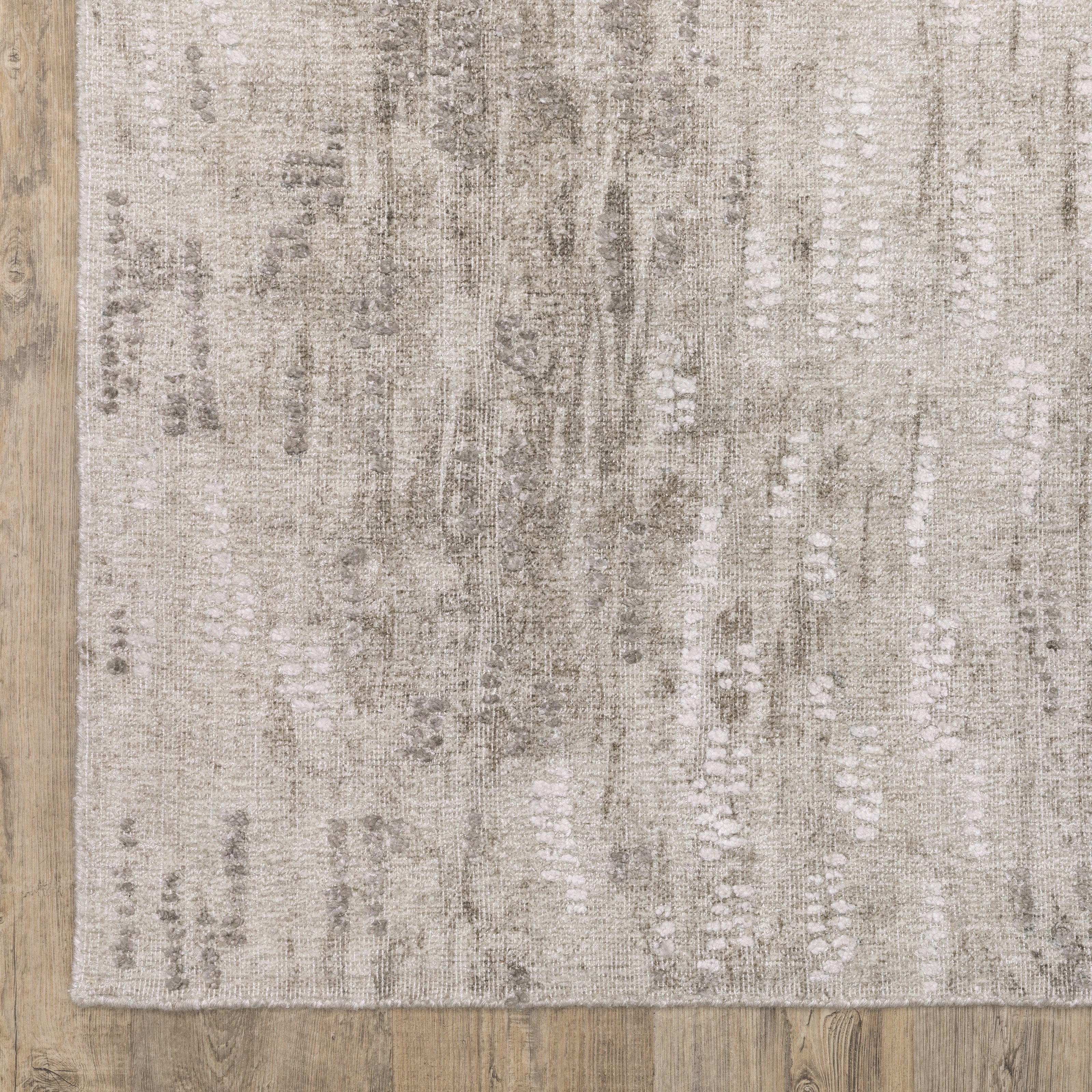 Oriental Weavers Clarke CLA08 soft modern rug featuring abstract pattern in beige/ brown tones