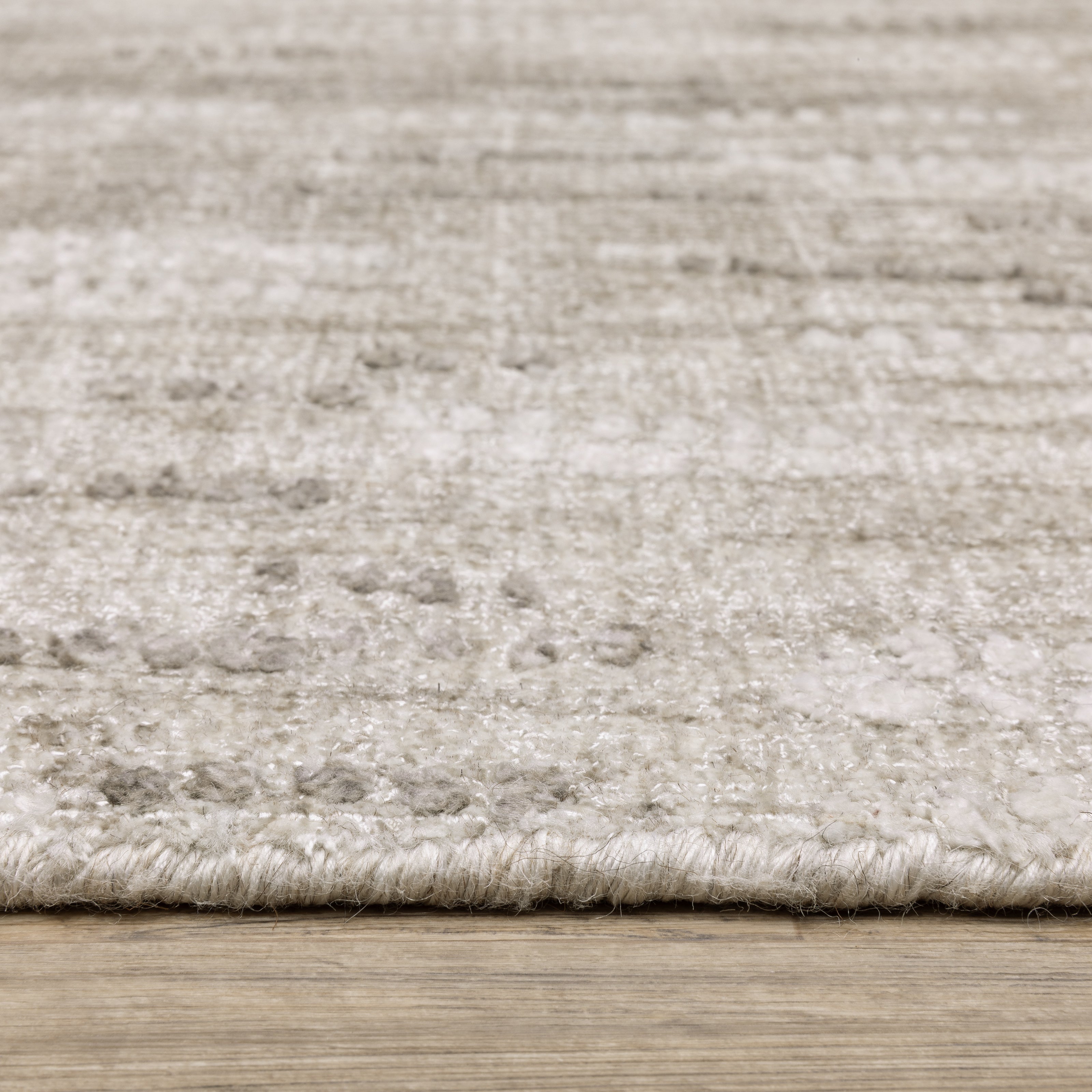 Oriental Weavers Clarke CLA08 soft modern rug featuring abstract pattern in beige/ brown tones