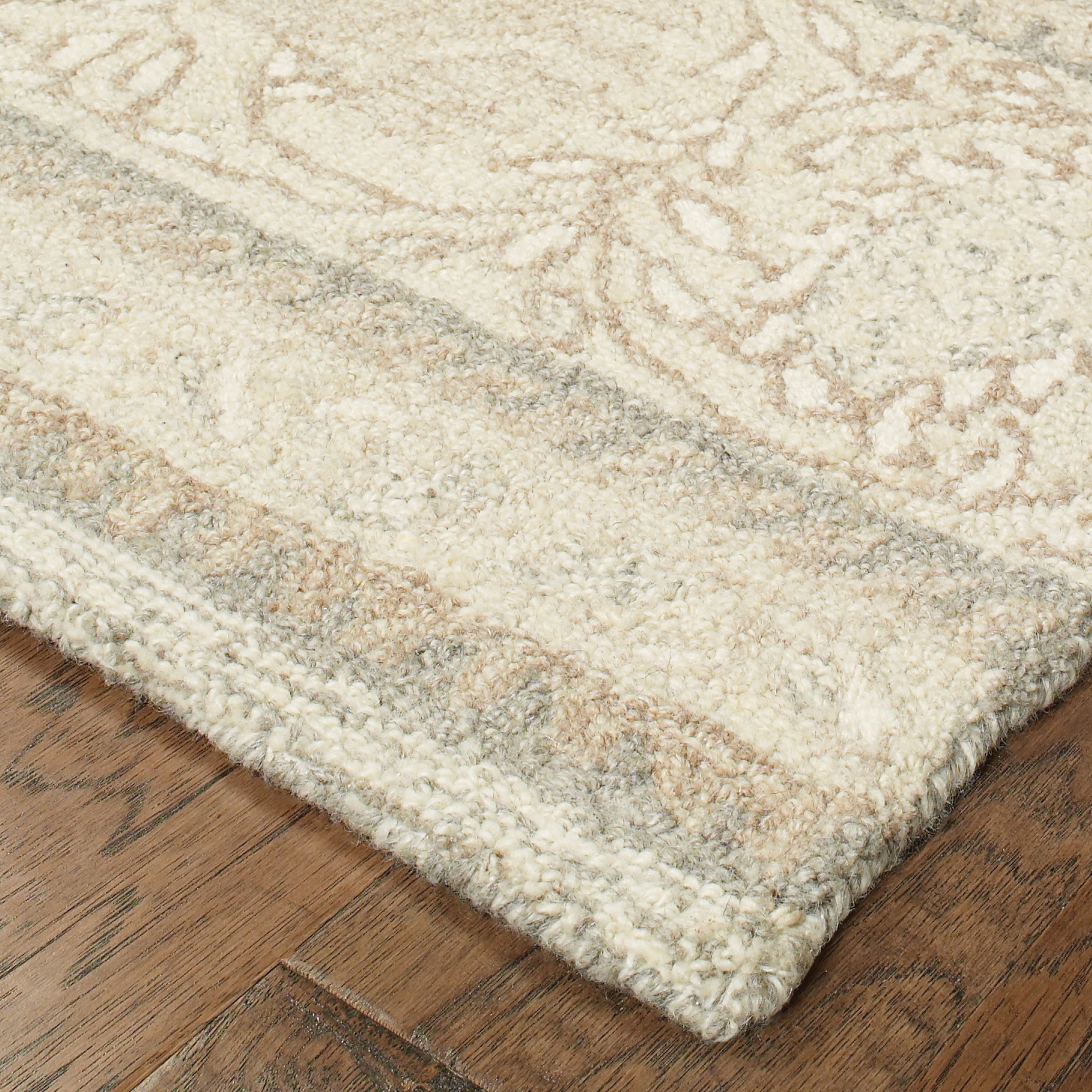 Oriental Weavers Craft 93002 soft traditional rug featuring decorative pattern in ash/ sand tones