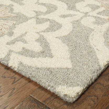 Oriental Weavers Craft 93004 soft traditional rug featuring decorative pattern in grey/ sand tones